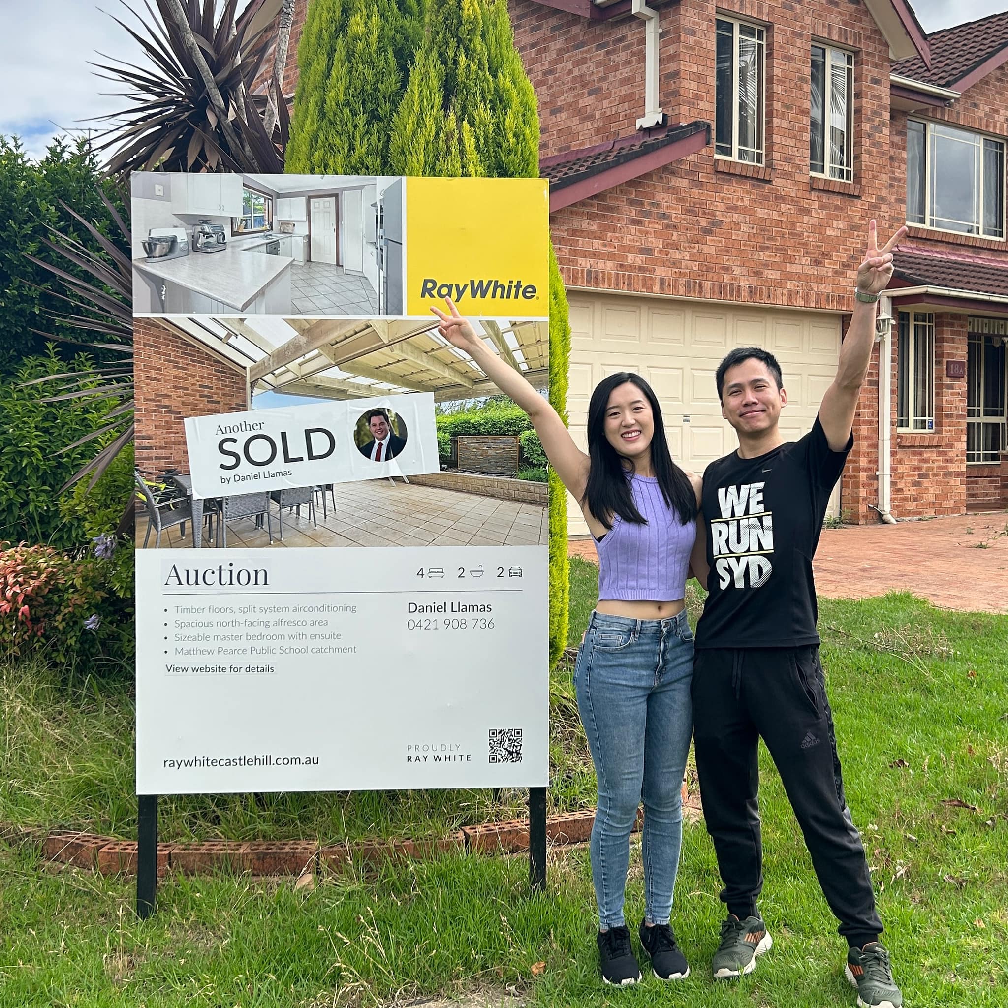 Hills District property clients celebrating outside 18A Springfield